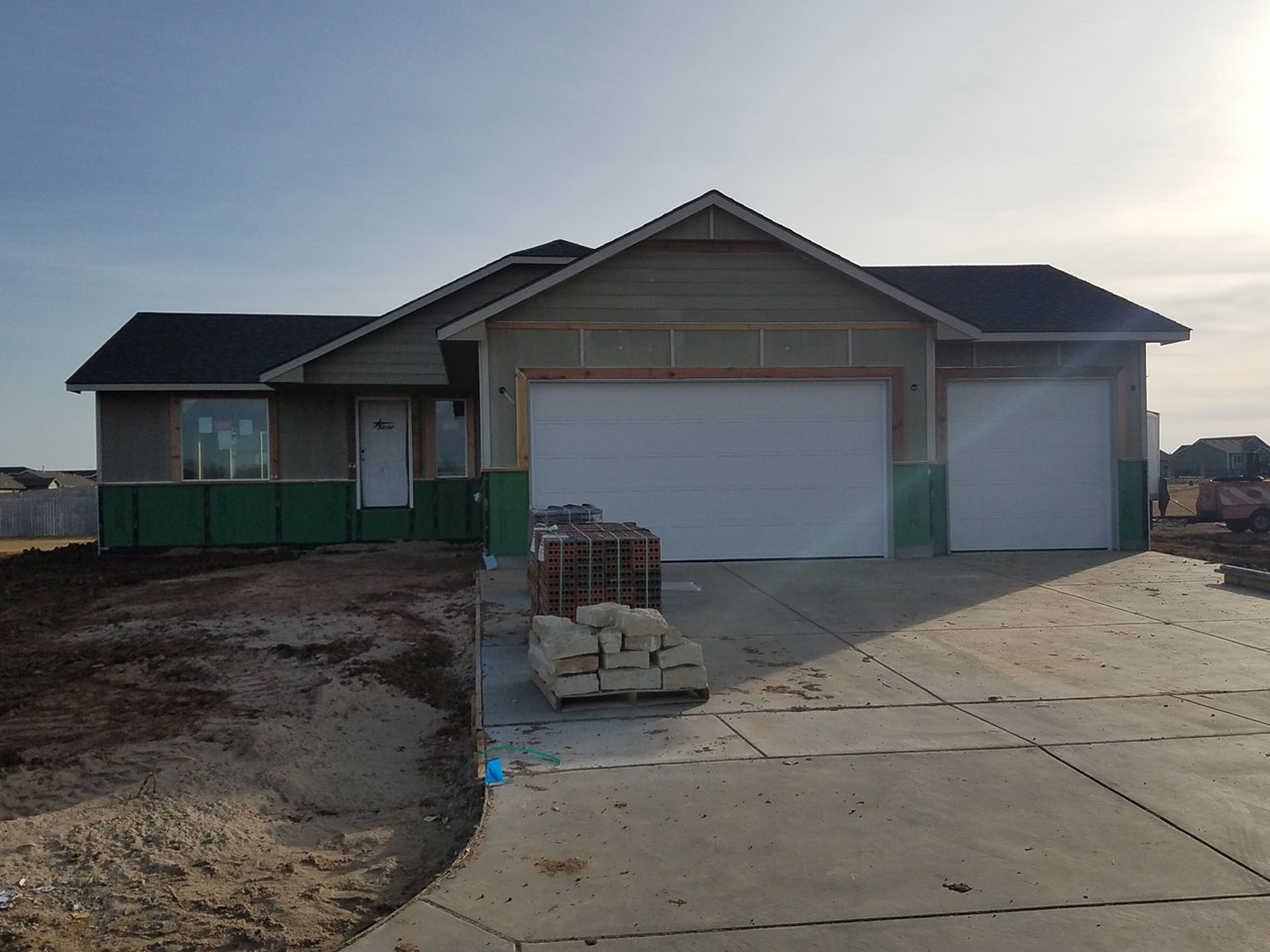 Siding, roof, and brick