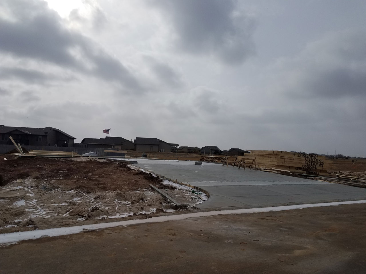 Flatwork concrete for the garage, basement floor, and driveway